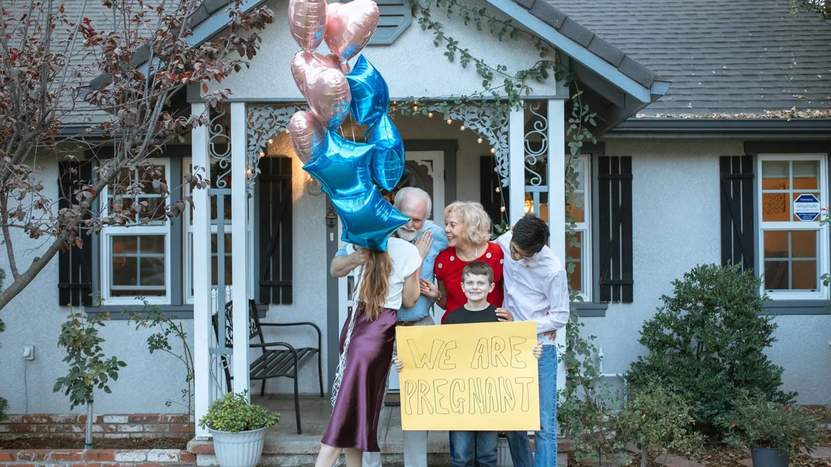 A family celebrating getting the keys to their new Las Vegas home