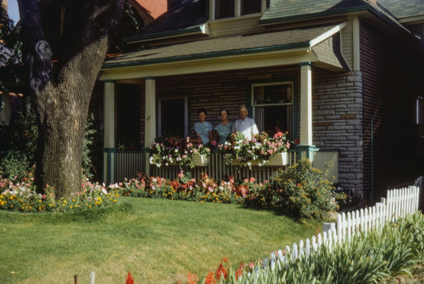 Family relaxing on the porch of their Las Vegas home in Centennial Hills, NV
