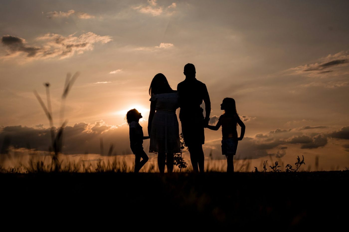 Las Vegas family in front of their home bought with a conventional loan in Summerlin