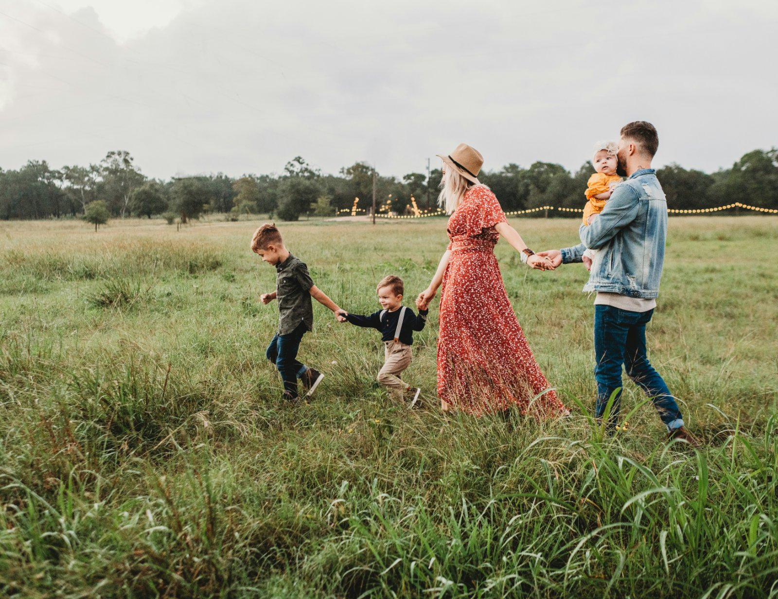 A young Nevada family walking together after financing their home with a conventional loan